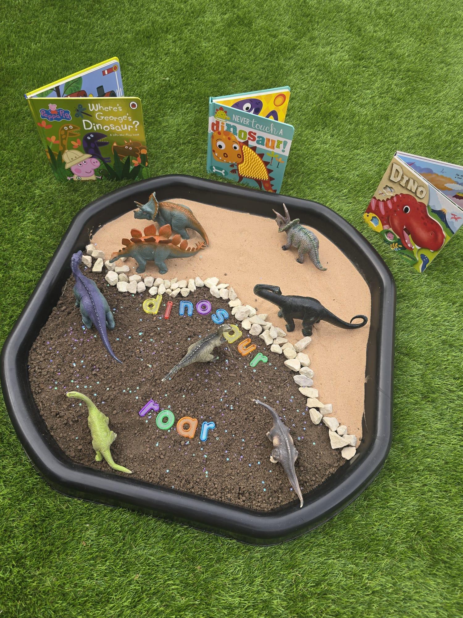 Dinosaur small-world tuff tray for learning through play